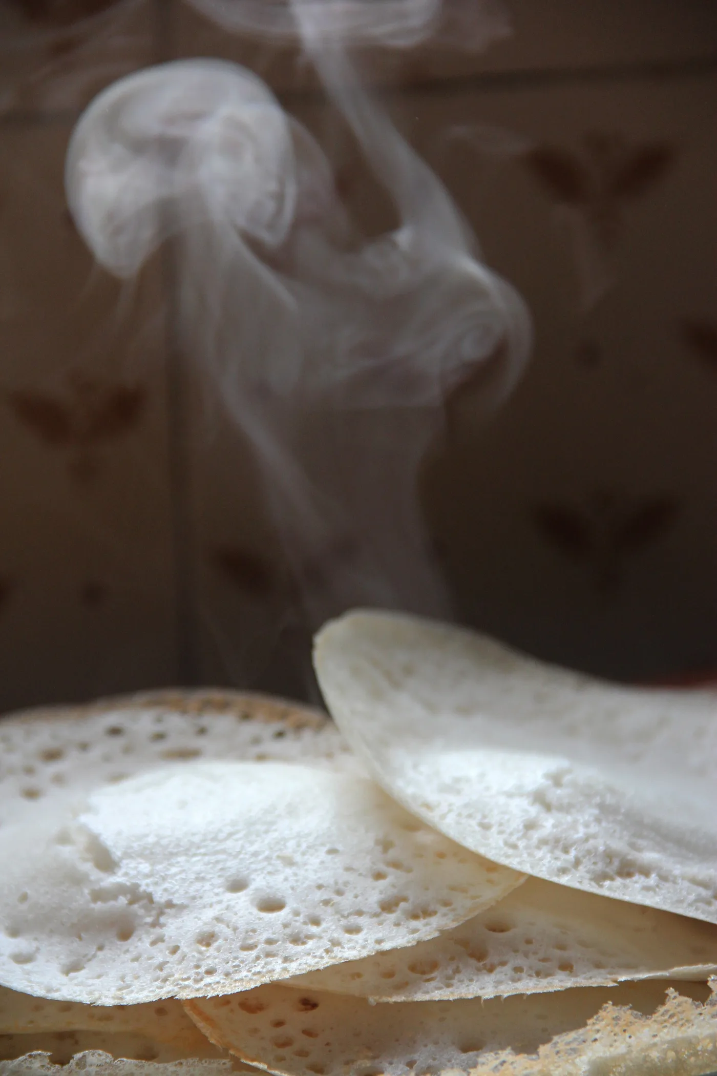 Hot palappam — spongy centre, crisp lace rim.